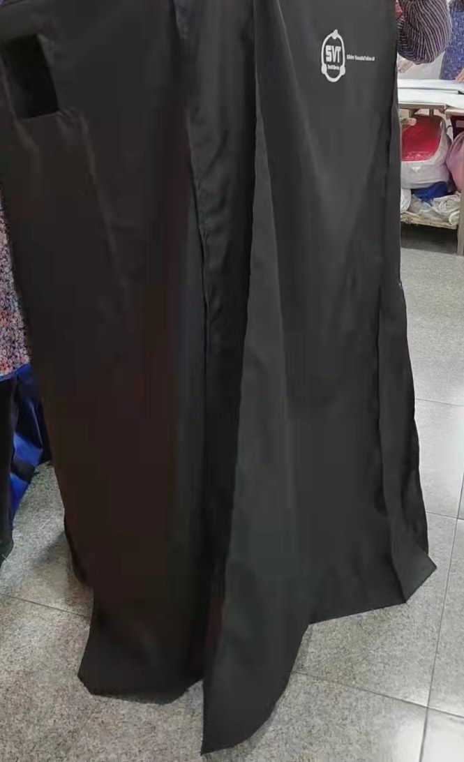 Black laundry cart cover fitted over a tall linen trolley