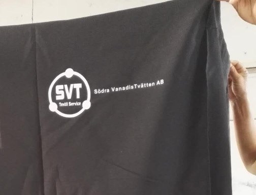 White SVT logo screen print on the black cart cover