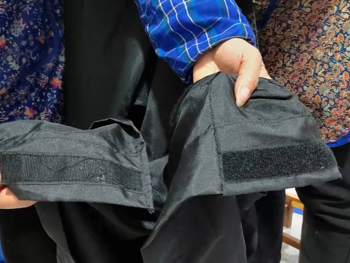 Velcro fastening detail on the cart cover door